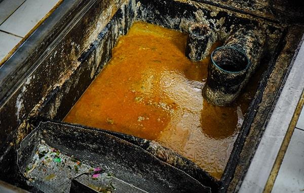 procrastinating on grease trap cleaning can result in foul odors, sanitation concerns, and expensive repairs